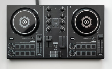 DJ mixing deck Controller connecting to Laptop and tablet using USB cable top view, isolated on white.
