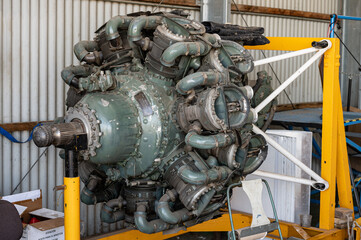 Detail of an aviation radial engine in a mechanical workshop