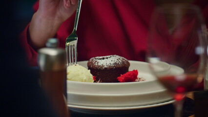 Young lady eat dessert ice cream on romantic evening. Woman on restaurant date.