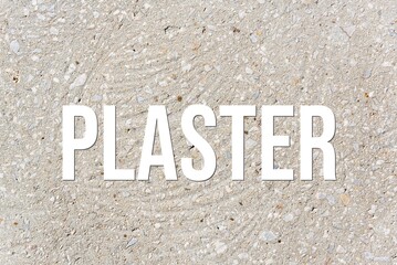 PLASTER - word on concrete background. Cement floor, wall.