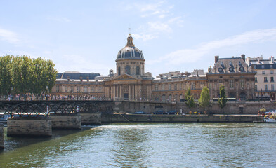 Bridge across the Seine and the Institute of France in Paris