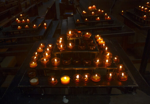 Prayer candles in Sacr-Coeur Cathedral in Paris, France	
