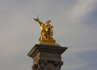Fototapeta na wymiar Fragment of Bridge of Alexander III in Paris, France