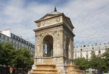 Fototapeta na wymiar Fountain of the Innocent in Paris, France