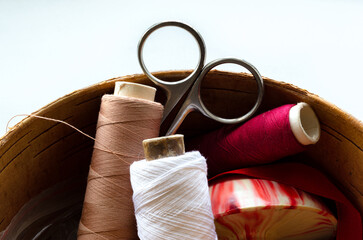 sewing supplies. spools of thread and scissors. 