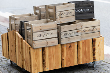 Skagen, Denmark A boutique sells wooden boxes with the name Skagen, the city, stenciled on them.