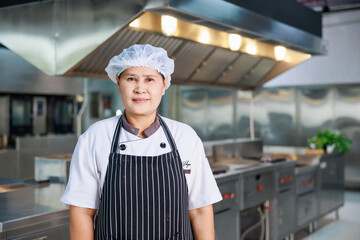 portrait senior asian chef. Cooking class. culinary classroom. cooking school.