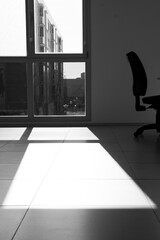 Shadows at the office in black and white
