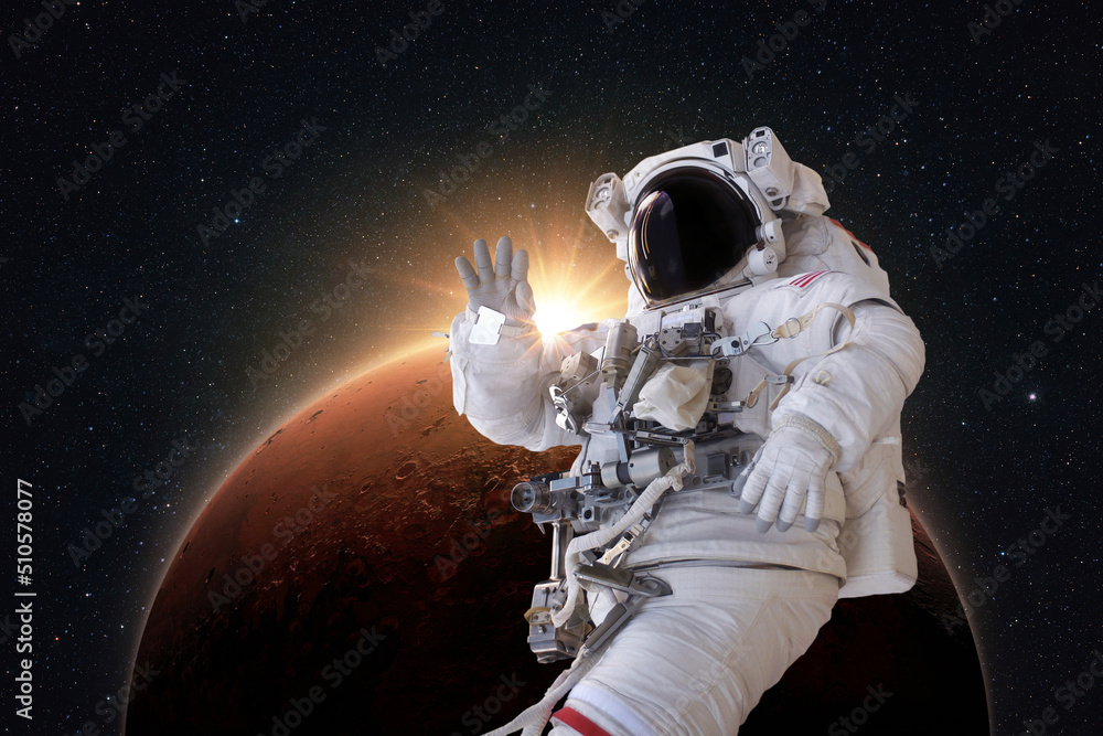 Aufkleber successful astronaut in a space suit levitates in space and explores the amazing red planet mars wit