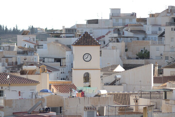 Church and white houses in the andalusian village of Algarrobo, Spain