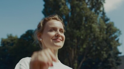 Beautiful woman sending air-kiss saying goodbye to children closeup. Mom support