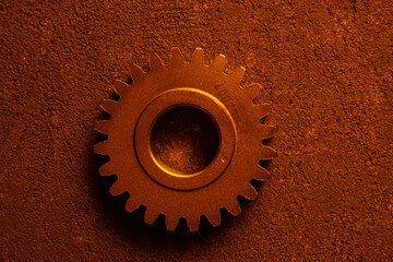 golden cogwheel gear. industrial machinery.