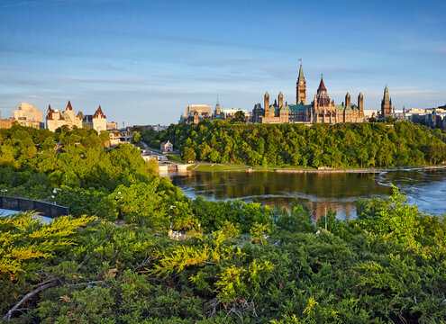 Aerial view of the skyline of Center Block and cityscape of Parliament Hill in Ottawa, Canada, at sunset