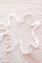 abstract background with lots of white wool and white lace