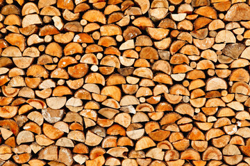 A neatly stacked stack of chopped firewood