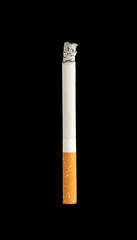 Burning cigarette isolated on black background. Drugs are harmful to the lungs.