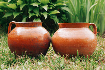 Two vintage ceramic clay pots outdoor