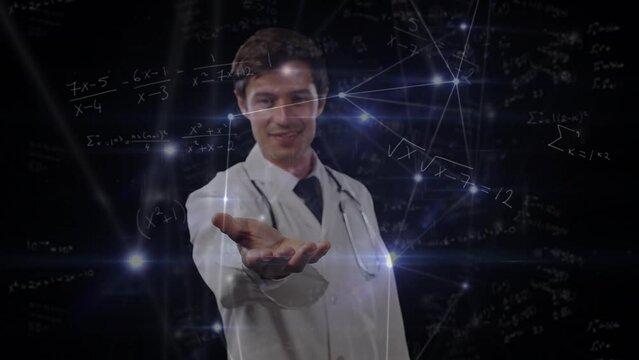 Network of connections against caucasian male doctor holding an invisible object