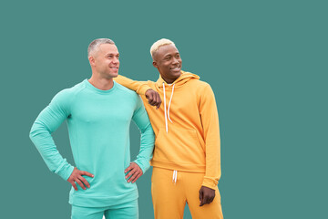 Multi ethnic friends. Two men different color black African-American ethnicity and white Caucasian...