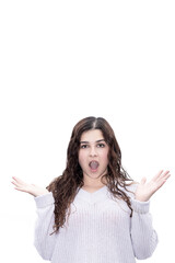 astonished young brunette woman on white background