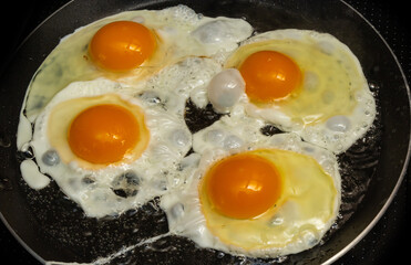 the process of preparing eggs for morning breakfast