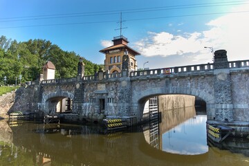 Horin canal water lock in Czech Republic - Europe.  Historical lock in shape of bridge in Horin by...