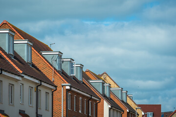 Fototapeta na wymiar New built terraced houses under in england uk