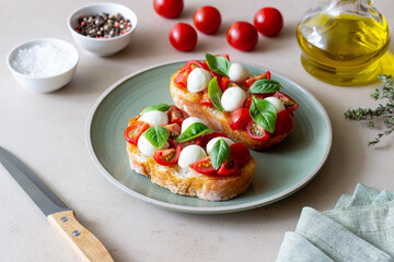 Bruschetta with mozzarella, tomatoes and basil. Vegetarian food. Healthy eating.