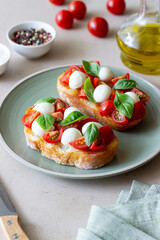 Bruschetta with mozzarella, tomatoes and basil. Vegetarian food. Healthy eating.