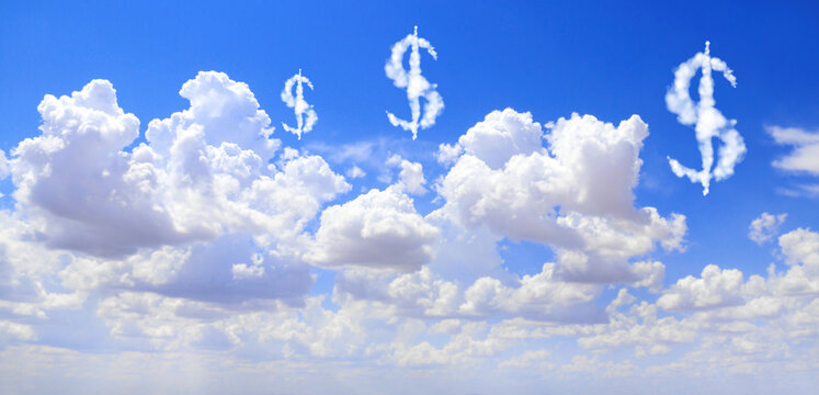 Money making. US dollar signs in the clouds. Clouds shaped as USA dollar currency symbols