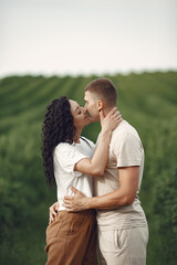 Fototapeta premium Beautiful couple spend time on a summer field