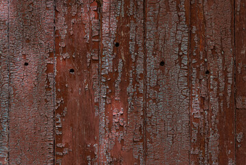 Background of red cracked wooden planks