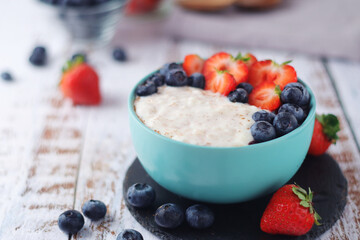 Milk rice with berries ready for breakfast