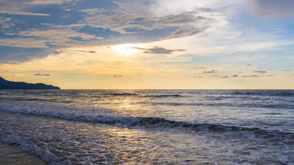 beautiful and clean beach with beach wave during evening
