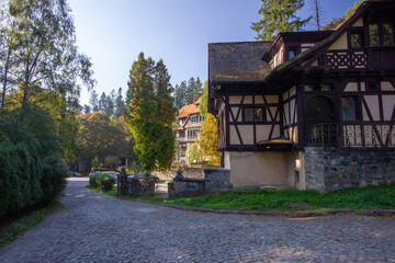 small tavern near old castle in a beautiful forest