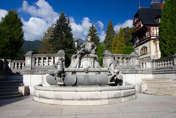 Statue fountain composition in palace garden