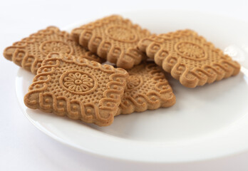 Sweet cookies on a white plate
