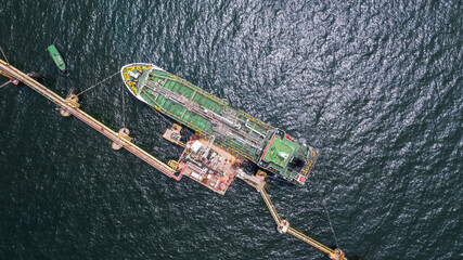 Aerial view petrochemical tanker park offshore at oil terminal commercial port for transfer crude...