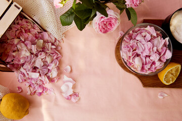Homemade natural tea rose jam preparing with sugar, lemon and tea rose petals. Healthy recipe....