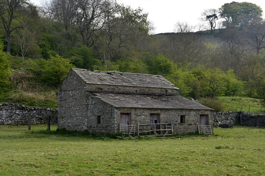 Old Stone Barn in a Pasture in England