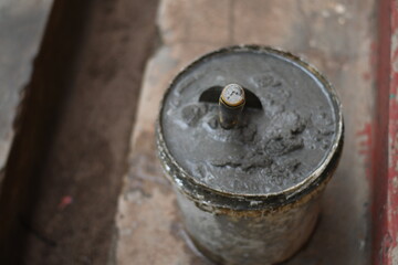 Mixed concrete Plaster on a bucket