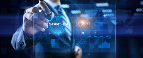 Startup new business idea. Businessman pressing button on screen.