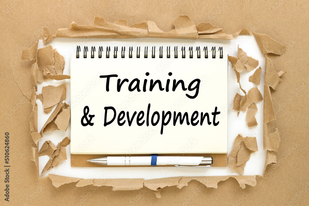 Poster the words are written on a notepad near the torn paper, learning and development. training and devel