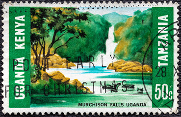 KENYA UGANDA TANZANIA - CIRCA 1966: A stamp printed in Kenya Uganda Tanzania shows Tourist...