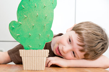 Corrugated cardboard cactus with wooden toothpick spikes. 5 minute crafts, easy game ideas....