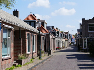 Row of historical houses in (Dutch) Sloten (Frisian) Sleat, Friesland, Netherlands