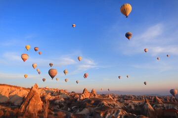 Mountain landscape with air balloons in Goreme, Cappadocia,Turkey