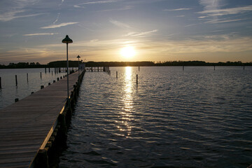 Naklejka na ściany i meble sunset on the pier