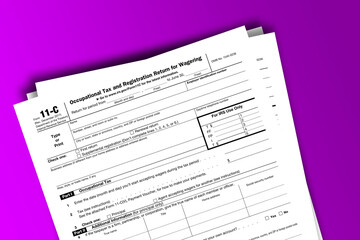 Obraz premium Form 11-C documentation published IRS USA 12.21.2017. American tax document on colored