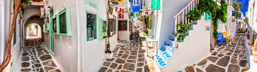 Traditional Greece, White paved narrow streets of Paros island,  Cyclades. Popular touristic place...